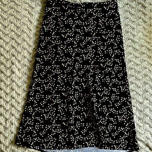 Rachel Zoe midi skirt. Black and floral, size 6.